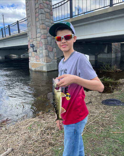 Hayden of Fishing Club with his first Walleye of the Season!